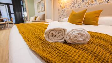 Een strijkplank/strijkijzer, gratis wifi, beddengoed