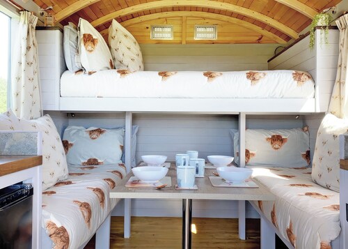Curly Cow is a marvellous shepherd’s hut that sleeps up to four people.
