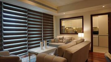 Comfort Apartment | Living area | Flat-screen TV