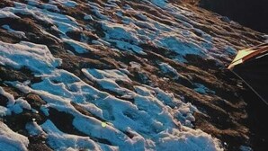 A mountainous landscape with a river flowing through it. - Triund Trek and Camping (Dharamshala)
