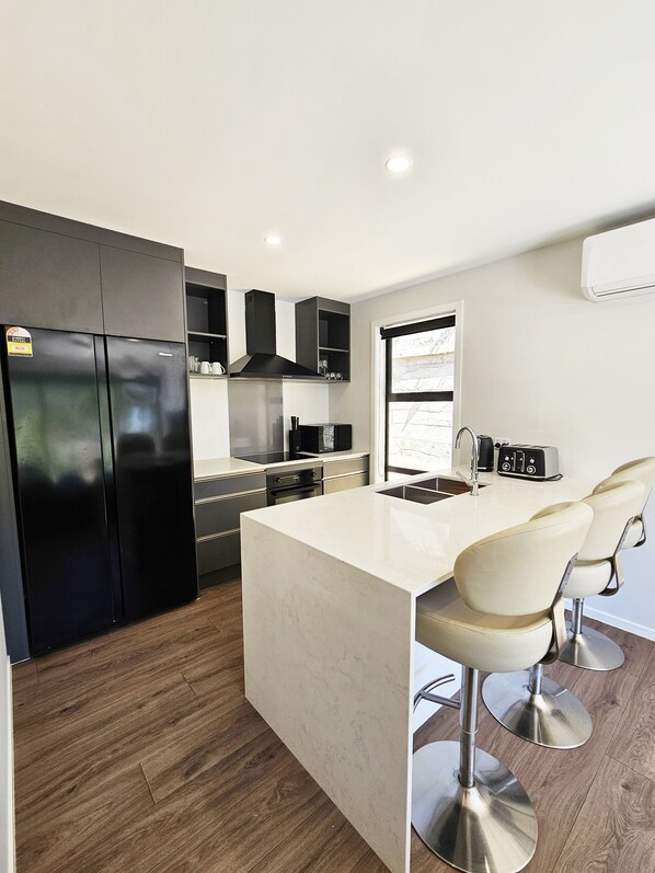 Fridge, microwave, stovetop, electric kettle - NEW 3 Bedroom and Garage Home, City Fringe! (Wellington)