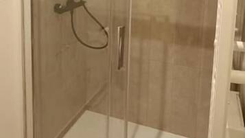 Ducha, secador de pelo