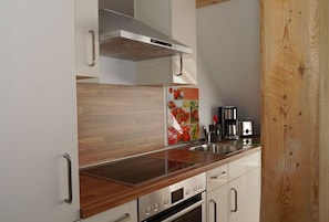 Réfrigérateur, four, plaque de cuisson, lave-vaisselle