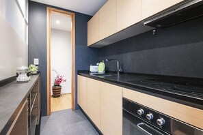 Fridge, coffee/tea maker, cookware/dishes/utensils