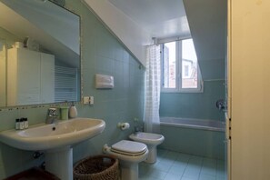 Hair dryer, bidet, towels