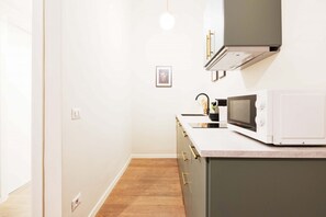 Fridge, microwave, dining tables