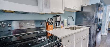 Fridge, microwave, coffee/tea maker, toaster