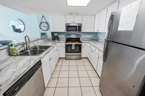 Fridge, microwave, coffee/tea maker, toaster