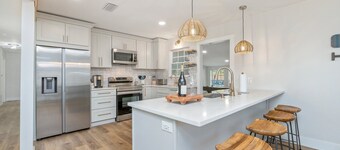 Updated 4-BR home. 7 mins from beach. Huge backyard w/ firepit