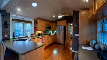 Fridge, microwave, stovetop, coffee/tea maker