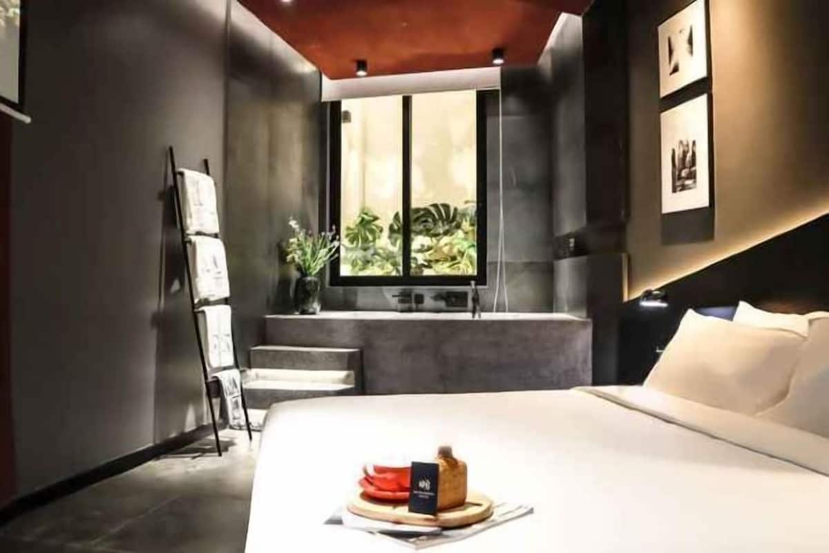 Free minibar items, desk, laptop workspace, blackout drapes