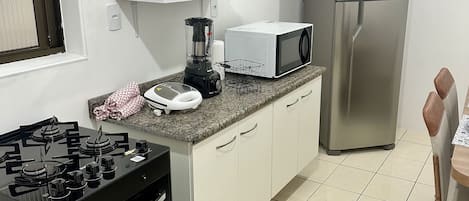 Full-size fridge, microwave, oven, blender