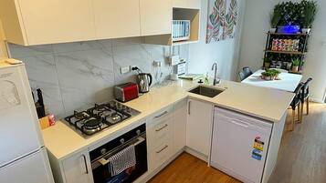Microwave, toaster, cookware/dishes/utensils