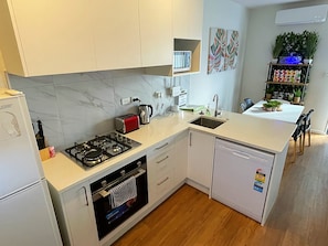 Microwave, toaster, cookware/dishes/utensils