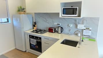 Microwave, toaster, cookware/dishes/utensils