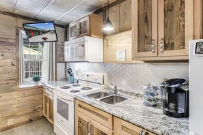 Cottage, 1 Bedroom | Private kitchen | Fridge, oven, stovetop, coffee/tea maker - Casas Coastal Experience Cabin C 1 Bedroom Cottage by RedAwning (Rockport)