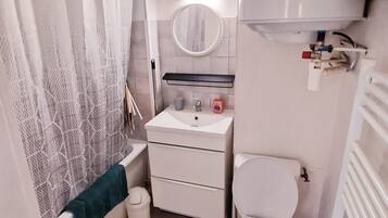 Hair dryer, towels, soap, toilet paper