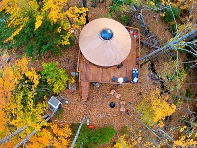 A yurt in the trees.  Close to Portland but close to nature.  Treeyurt Maine