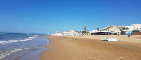 Sun-loungers, beach towels