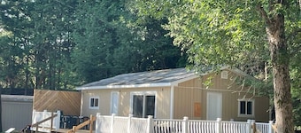 2 lakefront cottages on Shadow Lake with dock and water toys
