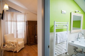 Shower, eco-friendly toiletries, hair dryer, towels