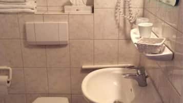 Shower, free toiletries, hair dryer, towels