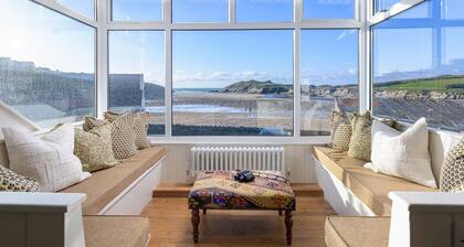 Porth Beach House is a laid-back coastal pad with front-row views of Porth beach sleeps 10