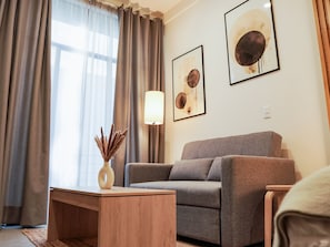 City Studio, 1 King Bed with Sofa bed, Balcony | Living area | 55-inch Smart TV with digital channels, Netflix, streaming services - indiana suites (Mexico City)