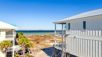 Enjoy breathtaking ocean views from the balcony of this two-story property.