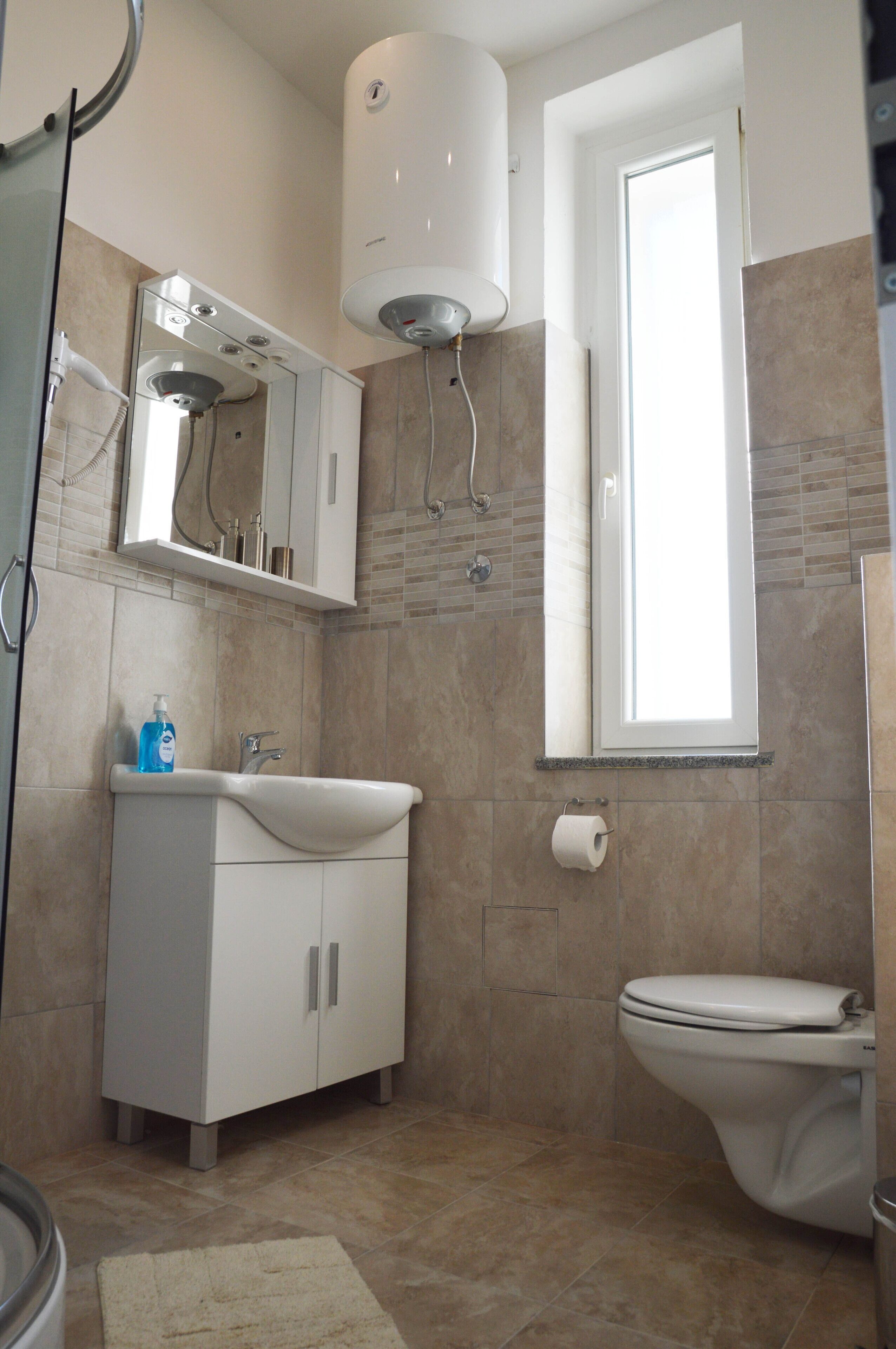Standard-Apartment | Badezimmer | Haartrockner, Handtücher