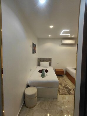 Egyptian cotton sheets, premium bedding, pillow-top beds, free minibar