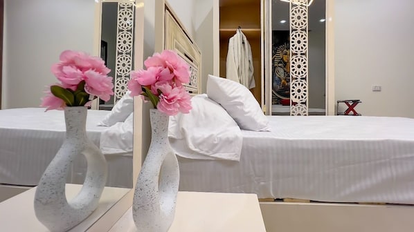 Egyptian cotton sheets, premium bedding, pillow-top beds, free minibar
