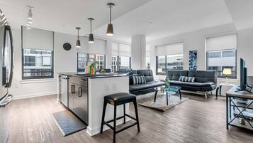 Family Apartment | Living area | 40-inch Smart TV with digital channels, Netflix, streaming services