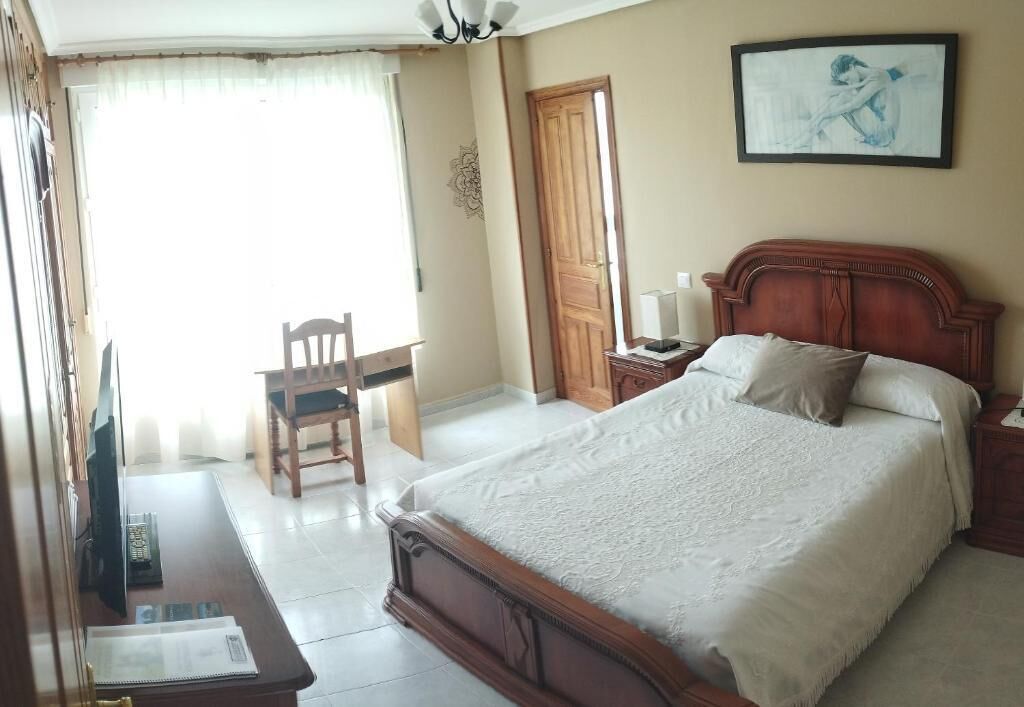 Hypo-allergenic bedding, down comforters, desk, laptop workspace