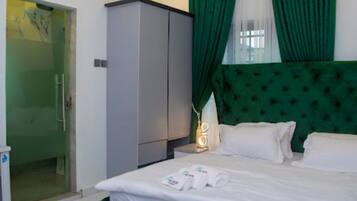 2 quartos, ferros/tábuas de passar roupa, Wi-Fi, roupa de cama