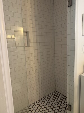 Shower, towels, soap, shampoo