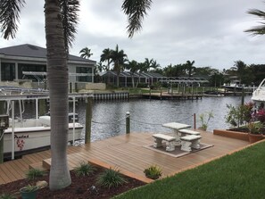 Terrace/patio - Beautiful Home on a canal. Heated pool. Sunrise and Sunsets are spectacular. (Cape Coral)