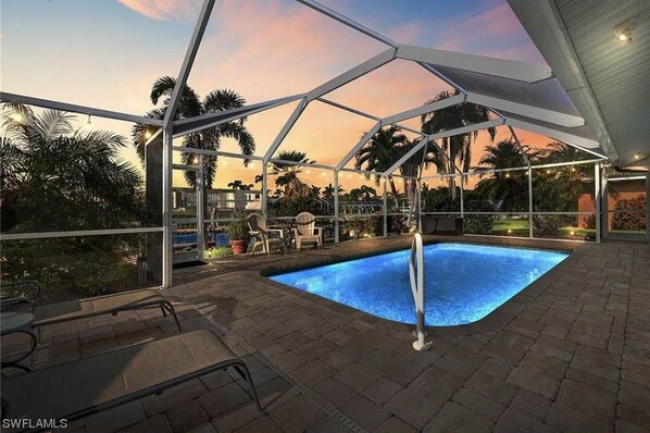 Pool - Beautiful Home on a canal. Heated pool. Sunrise and Sunsets are spectacular. (Cape Coral)