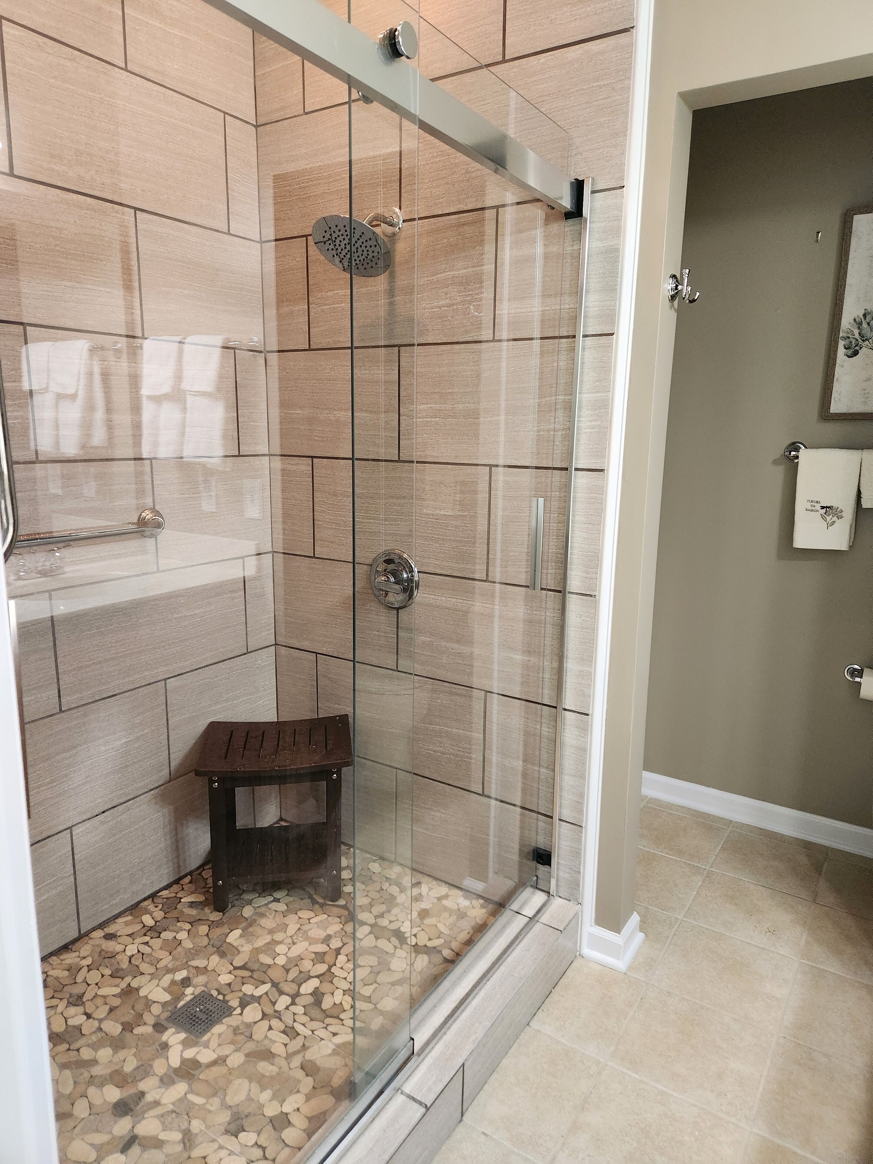 Shower, hair dryer, towels, toilet paper