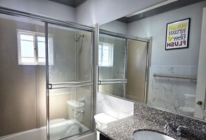 Hair dryer, towels, soap, shampoo