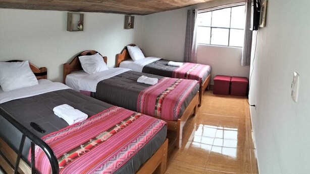 Deluxe Quadruple Room - The Hannahs House (Cusco)