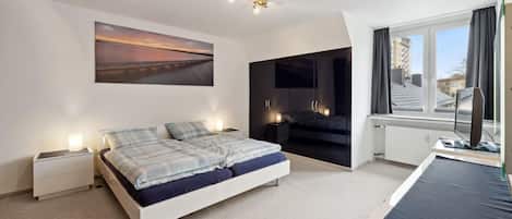 2 habitaciones, cuna de viaje, wifi gratis y ropa de cama