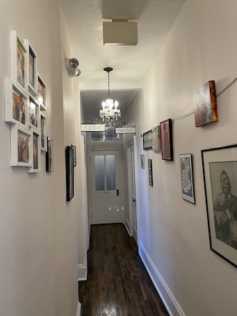 Gallery Room, 2 Queen Beds, Non Smoking, Shared Bathroom | Living area. Springer Station