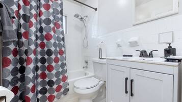 Hair dryer, towels, soap, shampoo