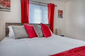 2 chambres, coffres-forts dans les chambres, fer et planche à repasser