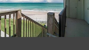 A balcony with a view of the beach and ocean. - Ocean front condo,  walk to quaint Vero Beach restaurants and shops.  (Vero Beach)