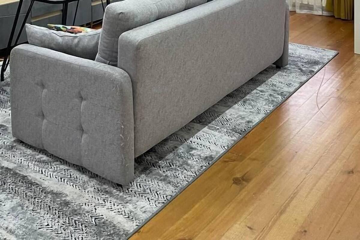 Departamento Deluxe | Cortinas blackout y tabla de planchar con plancha