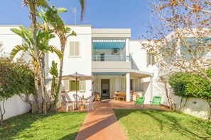 Family House, Multiple Bedrooms, 2 Bathrooms (Villetta Relax with pool in residence) | Terrace/patio