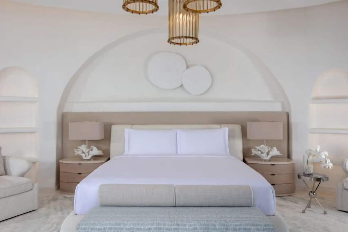 Premium bedding, minibar, blackout curtains, soundproofing