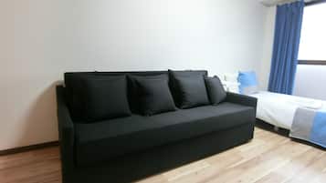 Family Studio | Individually furnished, desk, laptop workspace, bed sheets